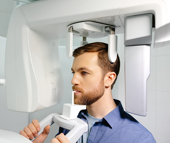 Panoramic image of teeth. A patient in a modern dental clinic takes a panoramic picture of the teeth.